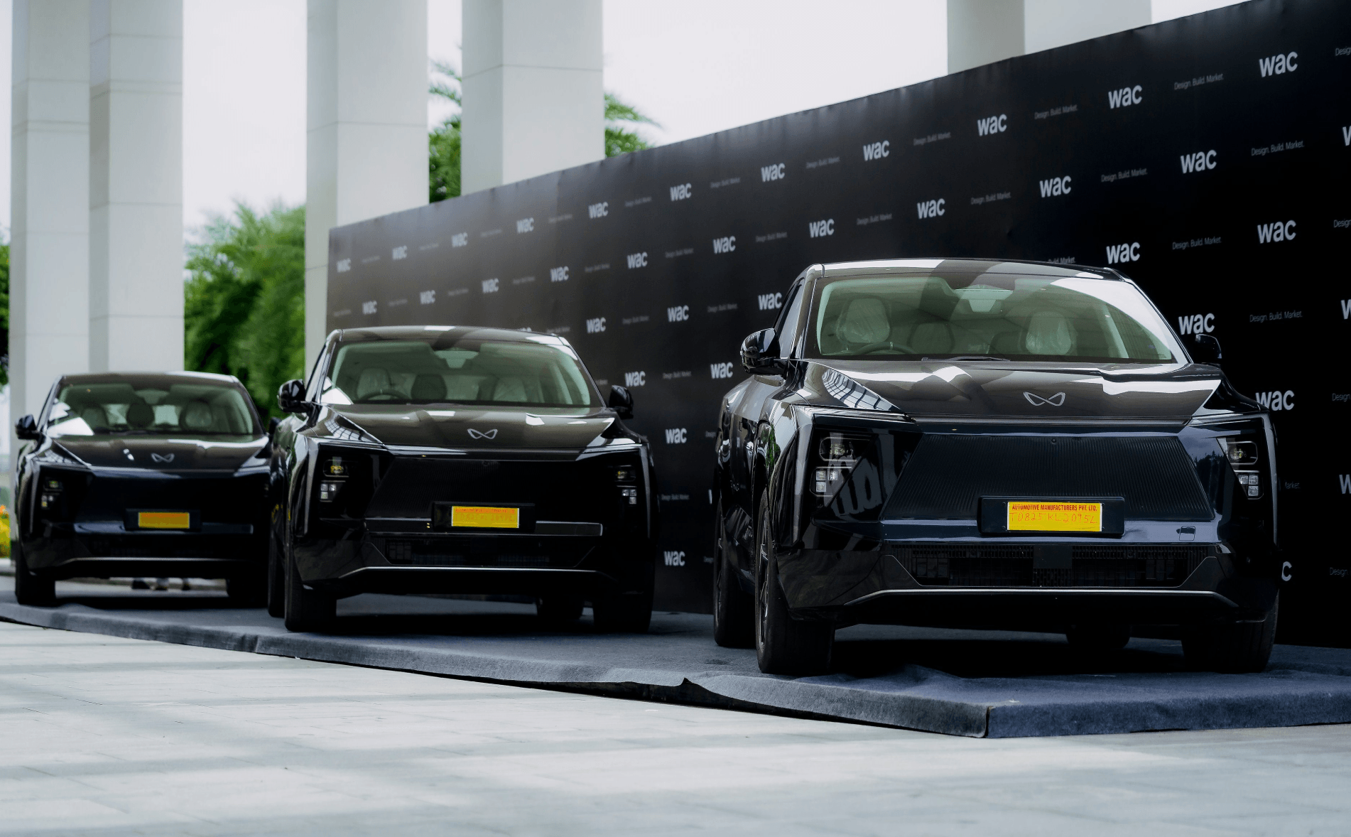 WAC Gifts employees 3 EV cars